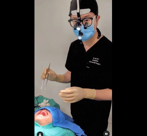 Dr. Li performing surgery - Instagram